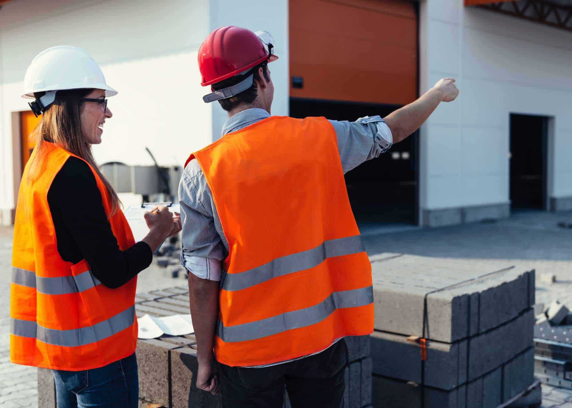 two civil engineers outside